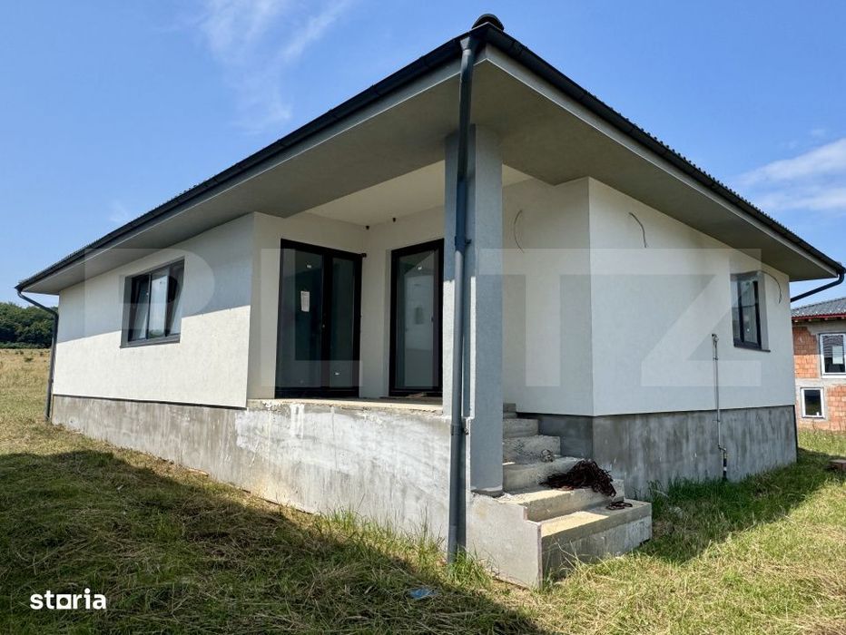Casa de vanzare, 105 mp, zona Corunca
