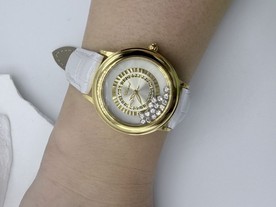 Женские золотые часы Chopard