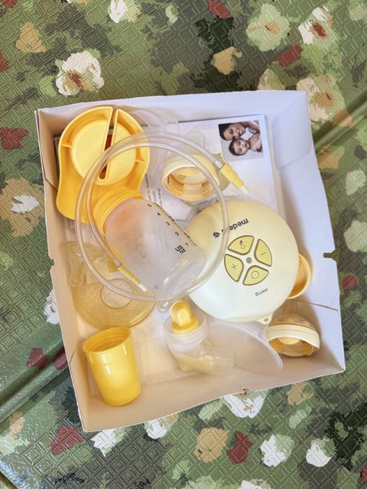 Молокоотсос Medela Swing Flex + аксессуары