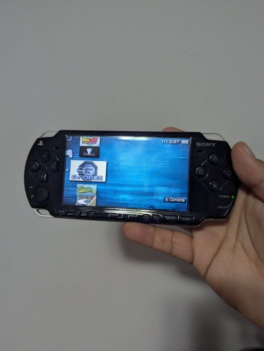 Psp 2004 modat cu jocuri card 64gb