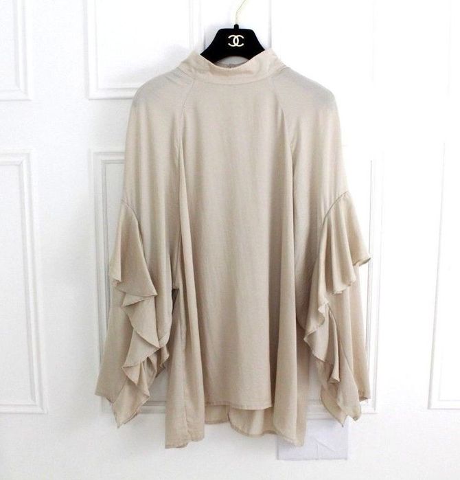 Bluza elegantă din colecția H&M Conscious mărimea M