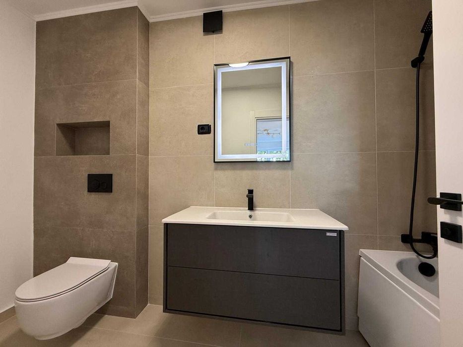 Apartament în casă cu curte terasata si garaj – la 5 minute de Centru