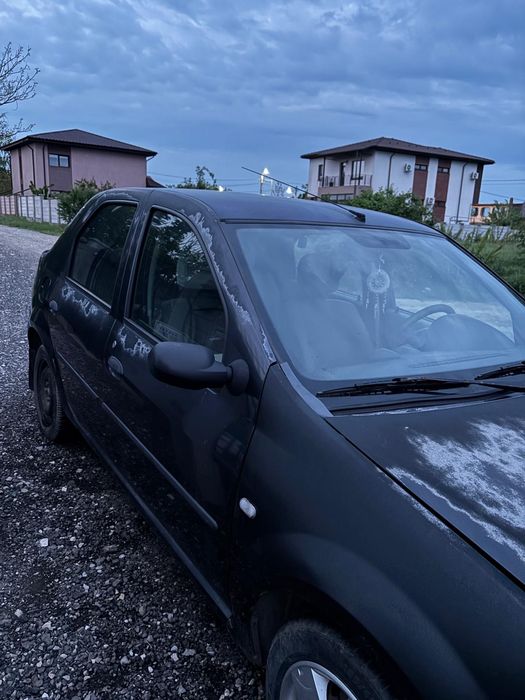Vând Dacia Logan