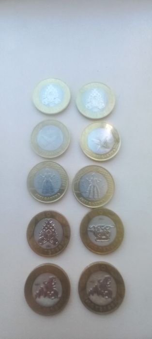 Монеты 100тг договорная