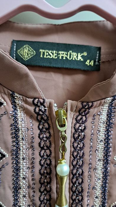 Платье новые привезли из Мекке