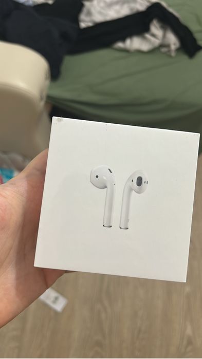 Airpods with charging case.