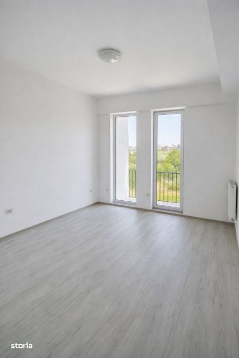 Apartament luminos cu vedere deschisa — fotografia 3