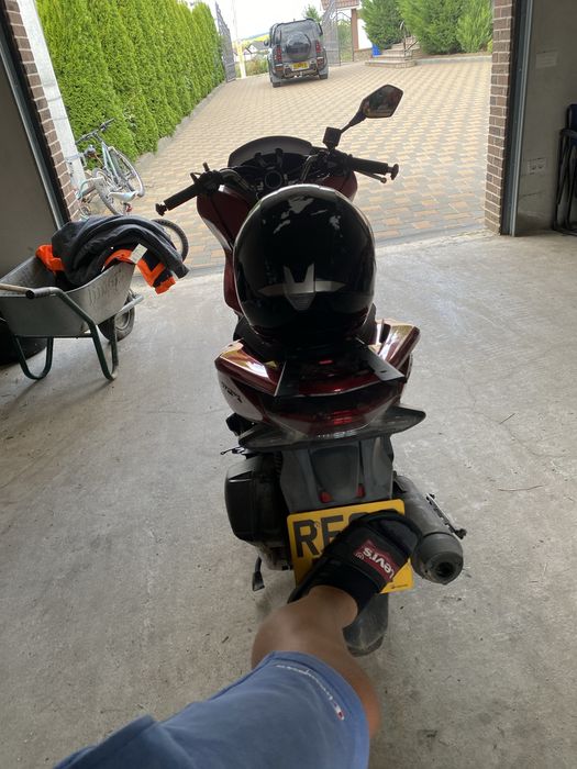 Scuter 125 motor conditie super o dau la vanzare ca nu o mai folosesc