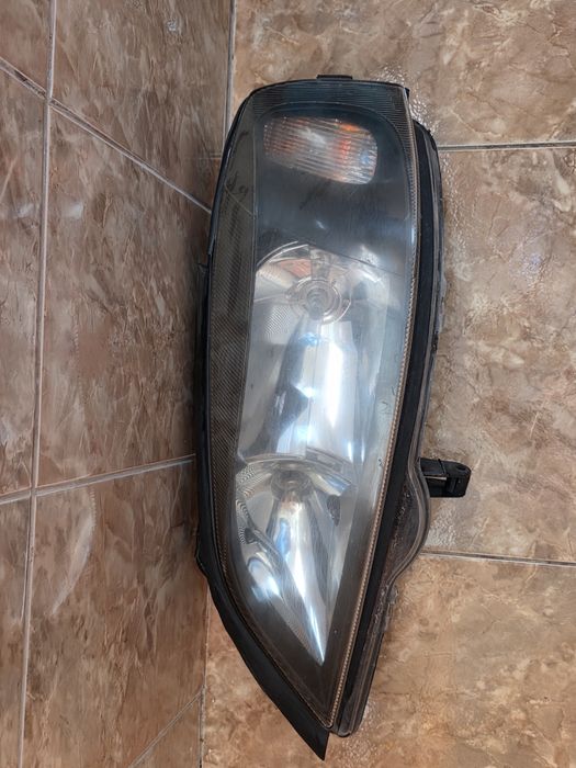 Vând set farurii astra g bertone  cu fundal negru