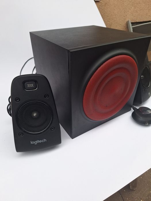 Sistem 2.1 bass profund, sunet clar, proba