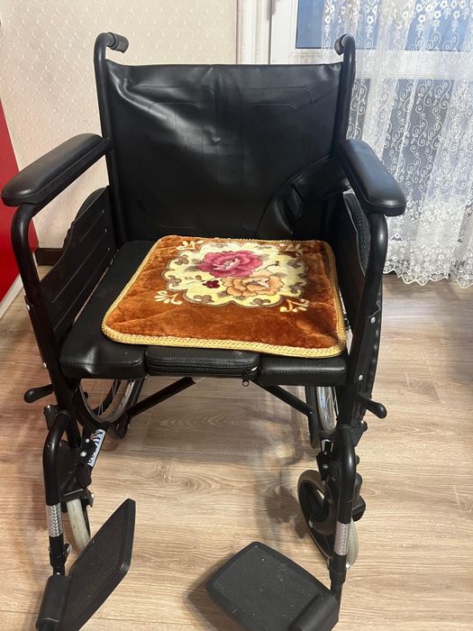 Коляска для инвалидни