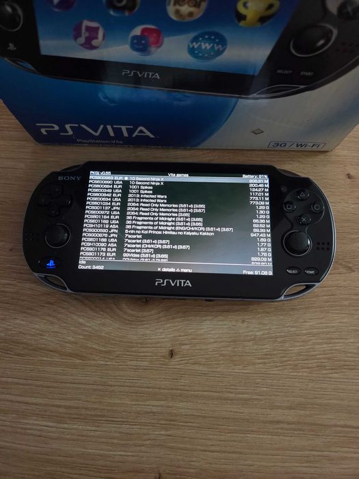 PS Vita Oled modat cu adaptor SD2Vita plus card Sandisk 64gb impecabil