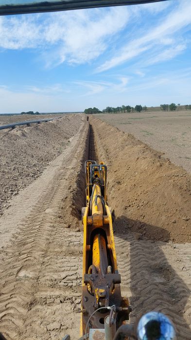 Экскаватор погрузчик услуги