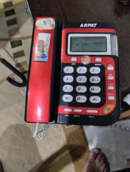 Стационарный проводной телефон