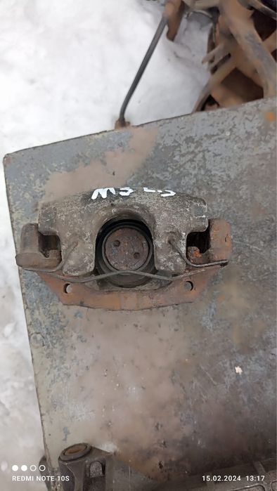 Суппорт задний Мазда 3 Mazda 3