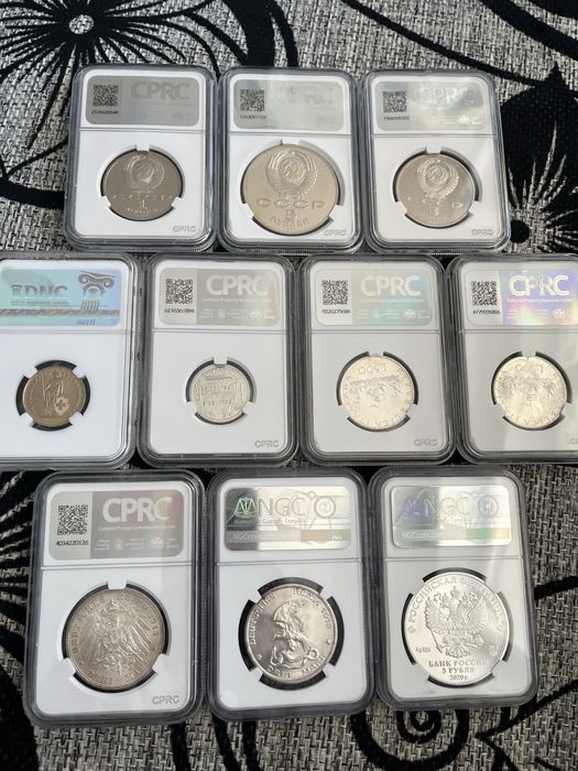 Монеты в слабах DNC, CRPC и NGC.