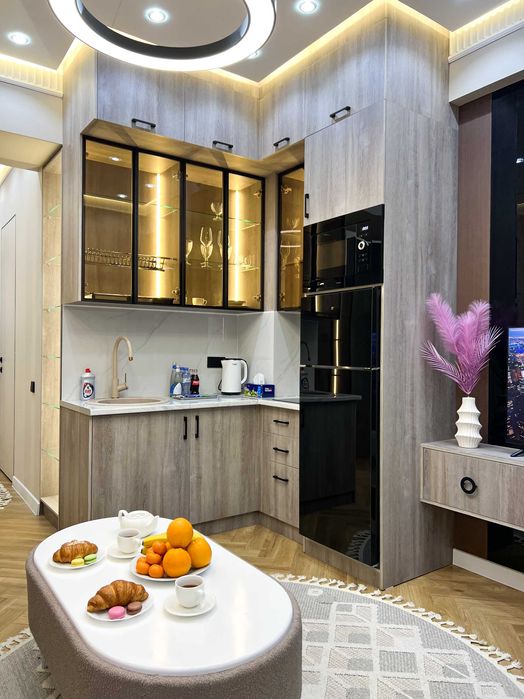 Дизайнерская студия с продуманным интерьером с видом на Ташкент сити