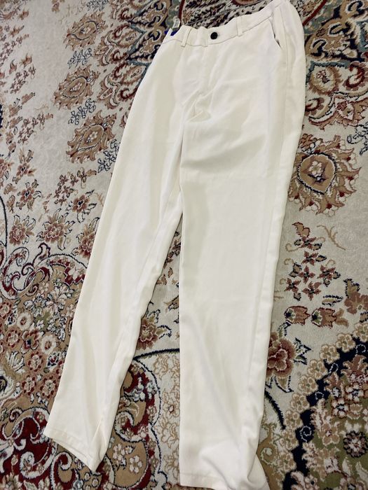 Белые брюки в веревке