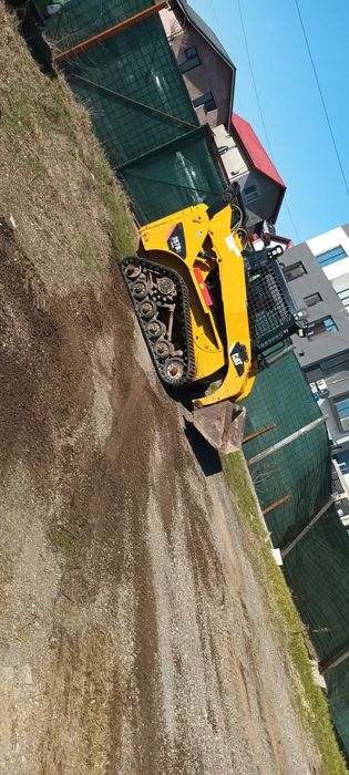 Miniincarcator bobcat ,incarcator frontal Caterpillar