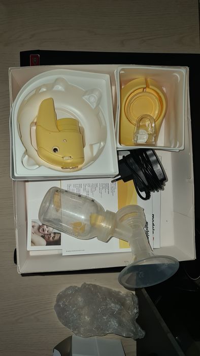 Электр.молокоотсос "medela"