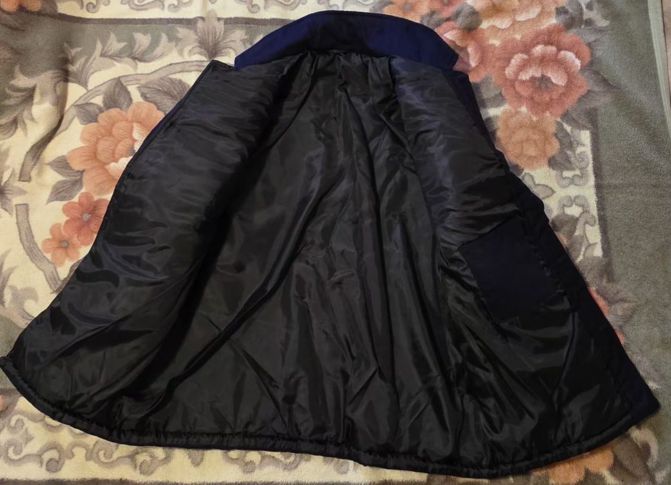 Pufoaica vatuita bleumarin inchis (marimea 52)