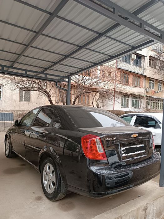 Chevrolet  Gentra qora 3 pozitsiya