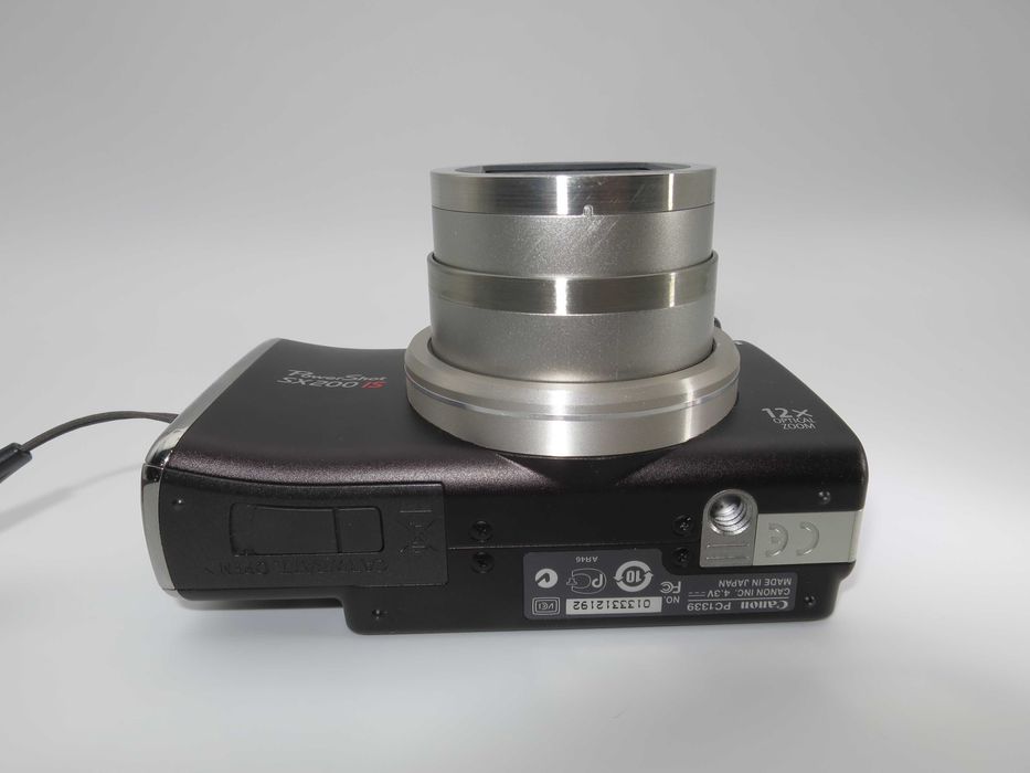 Canon SX200 ултра компактен цифров фотоапарат, дигитална камера с голям оптичен зуум, като НОВА - пълен комплект - работи отлично