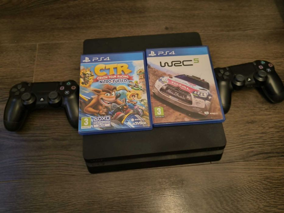 Consolă PlayStation 4 (PS4) 1TB + 2 Controllere + 2 Jocuri – Stare buna!