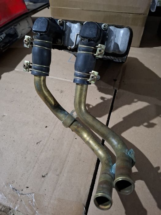 Радиатор печки Форд Маверик