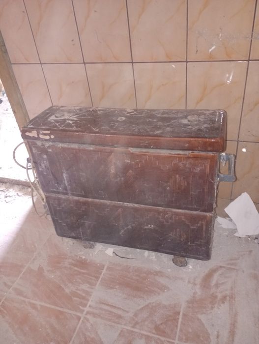 Soba  veche teracota și electrică