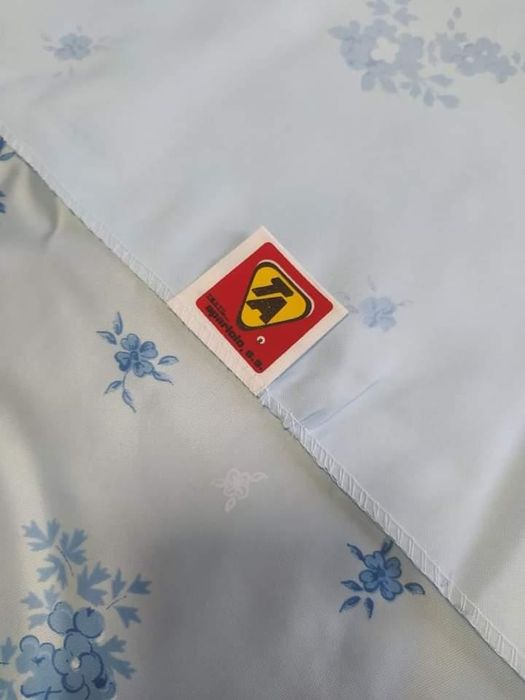 Покрывало с наволочками.