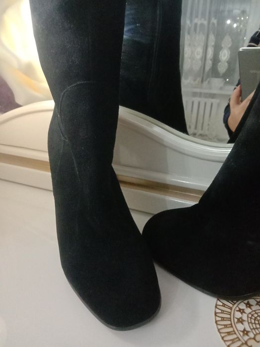 Продам новые зимние сапоги