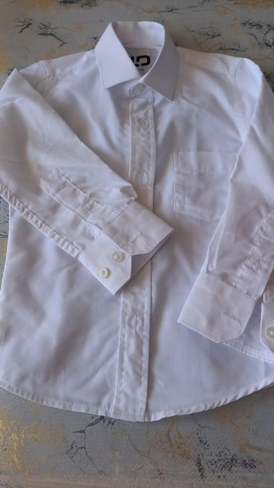 Продам  рубашки,костюм.
