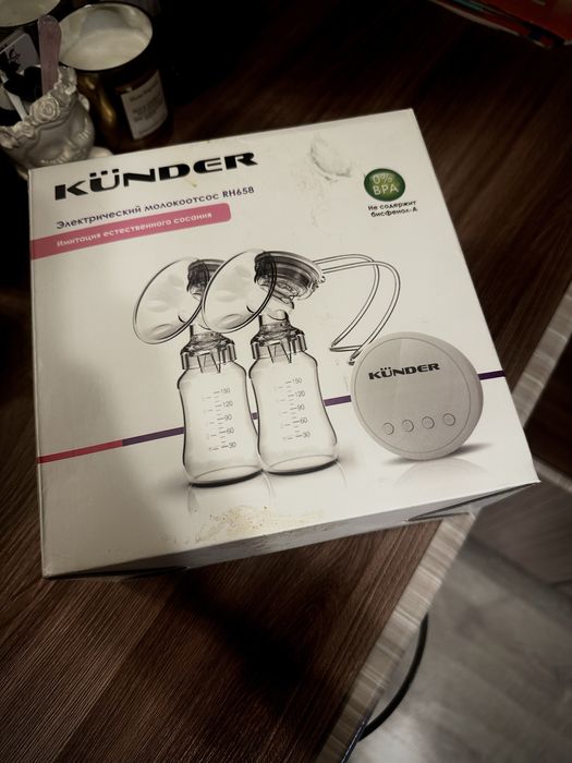 Электрический молокоотсос