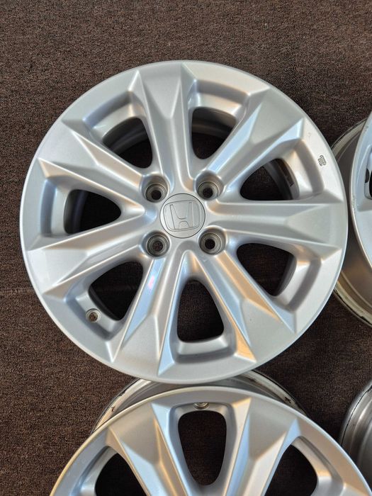 4 Jante Aliaj 4x100 15'' 5.5J ET 45 - OEM Honda JAZZ - Enkei Japonia - JANTE CA NOI !