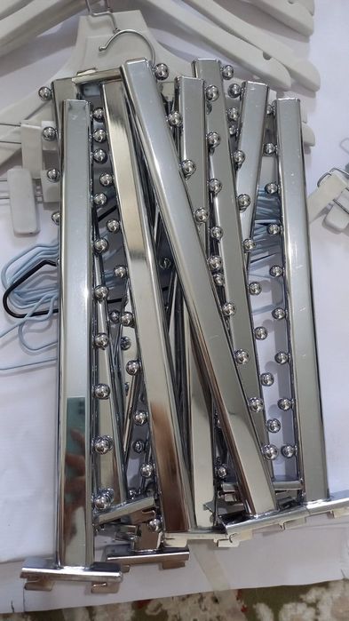 Вешалки настенные регулируемые