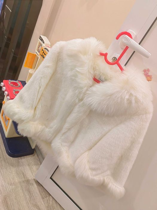 Пухено палто за зимните месеци.