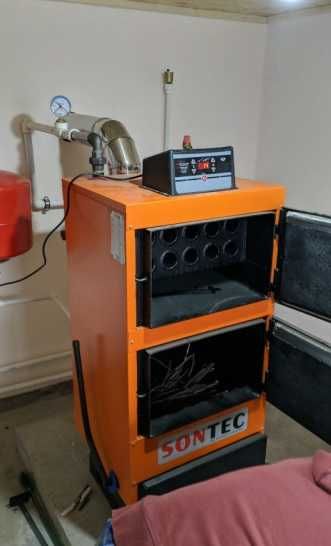 Cazan combustibil solid lemn 29 kw cu ventilator si panaou de comanda
