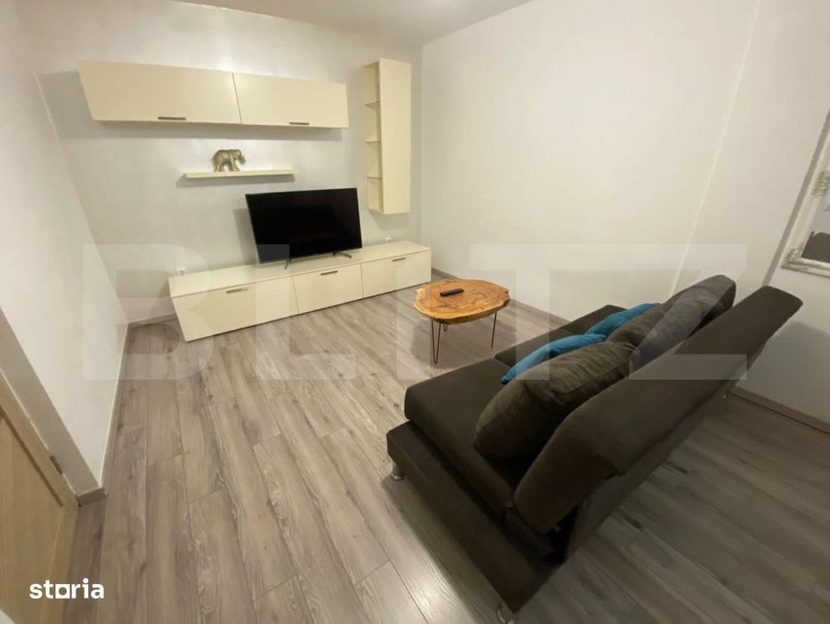Apartament 2 camere mobilat si utilat de 54 mp, parcare inclusa, zona