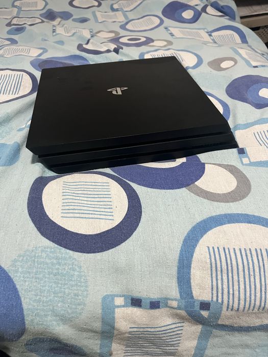 Ps 4 pro plus un joc la alegere