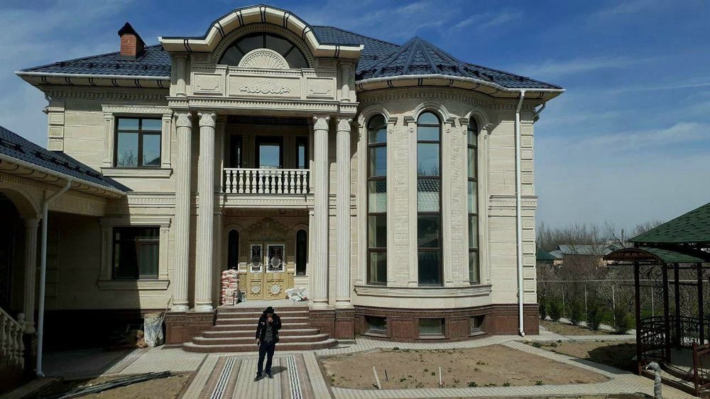 Мастера по фасадам из травертина и гранита