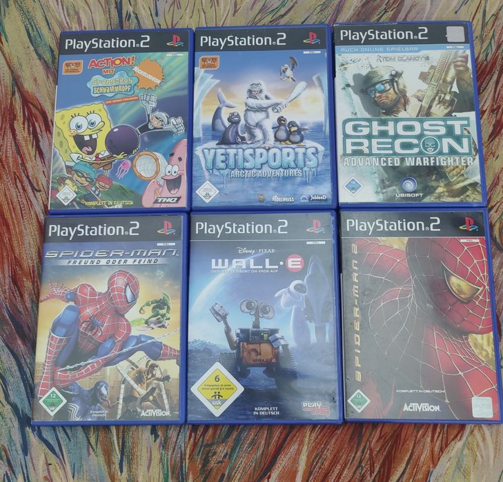 Vând PlayStation 2 slim modat cu 2 controllere.