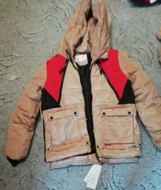 Продаю новый пуховик