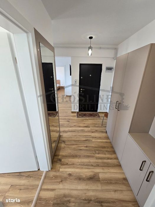 Apartament 2 dormitoare 1 open-space Parcare subterană privată inclusă