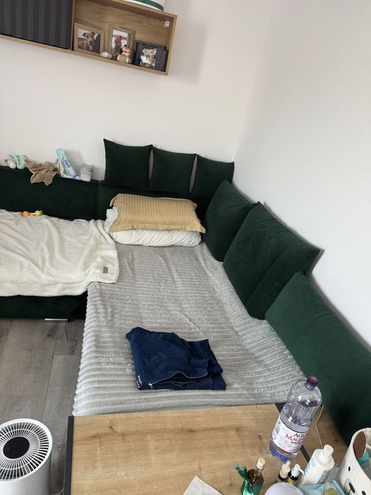 Vând colțar extensibil verde închis – stare foarte bună