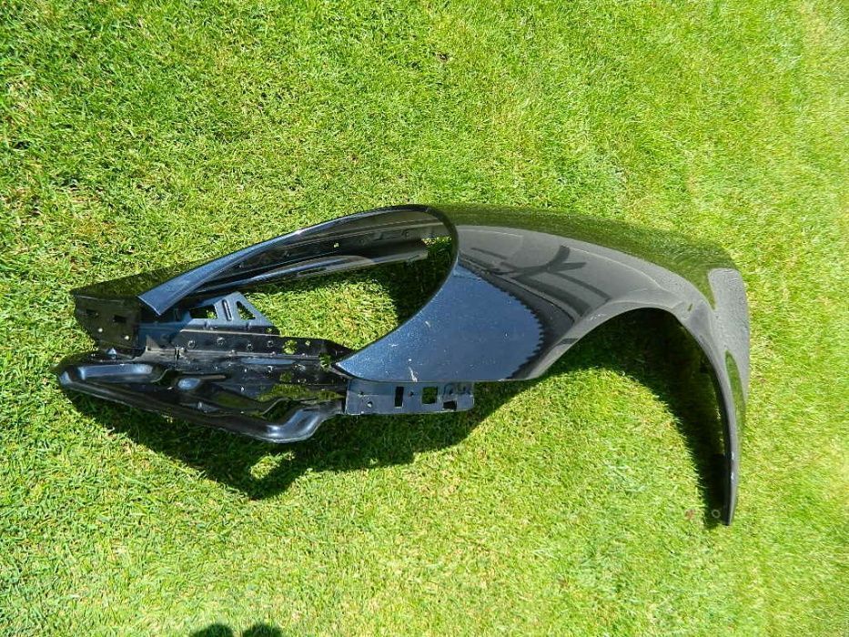 Aripa stanga fata Porsche Carrera model 2012-2015 cod 99150315500
