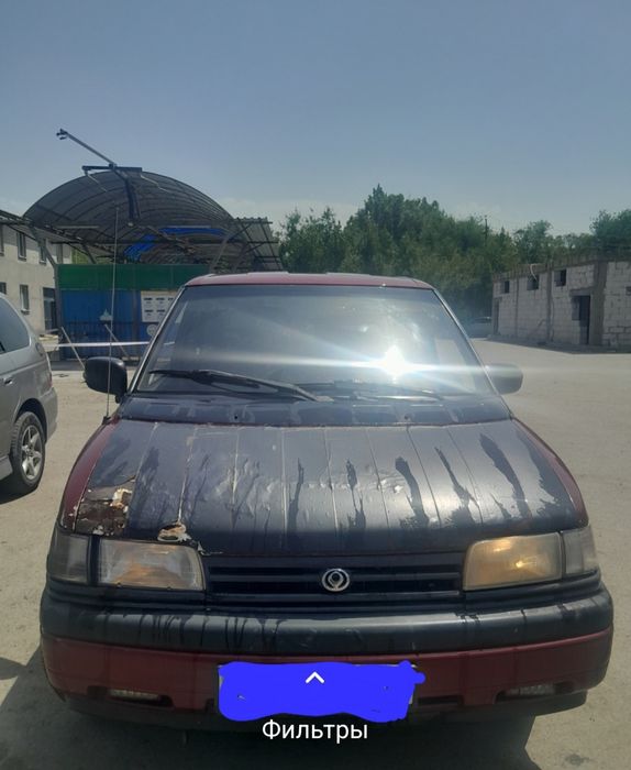 Авто  Мазда  МПВ