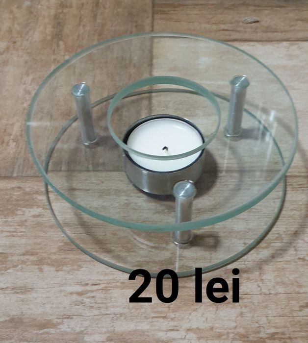 Suporturi pentru lumânări  din lemn, portelan, sticlă  si fier forjat