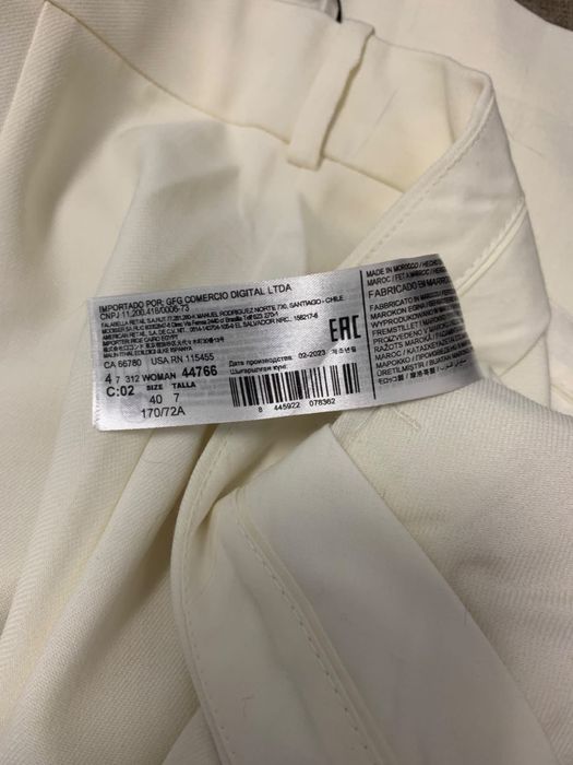 Pantaloni Mango drepti alb-crema