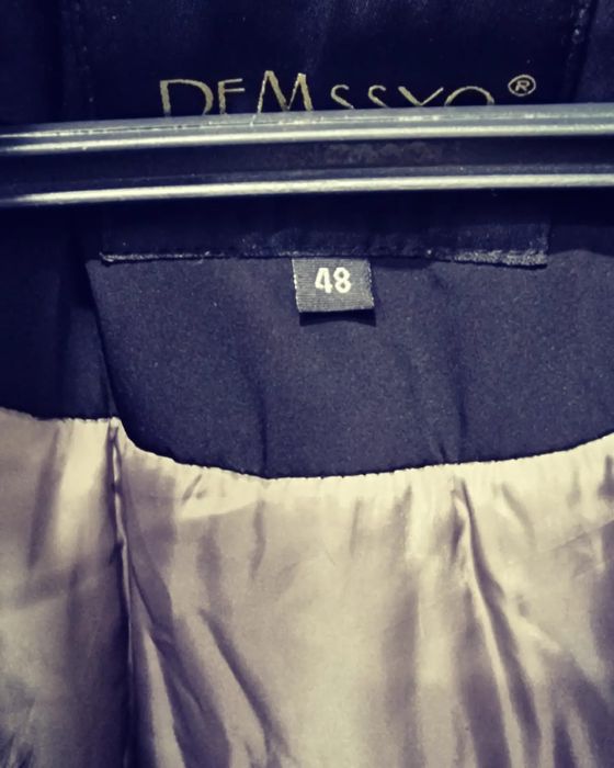 Черный пуховик